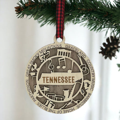 Celebrate the Volunteer State with our Tennessee State Highlights Ornament! A miniature masterpiece capturing the heart and soul of Tennessee's charm. Elevate your holiday decor with a touch of southern warmth. 