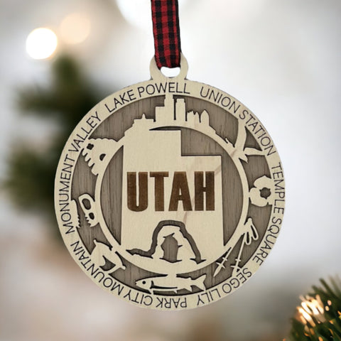 Elevate your holiday decor with the Utah State Highlights Ornament! A stunning tribute to the Beehive State's natural wonders and vibrant spirit. Bring home a piece of Utah's beauty this festive season.