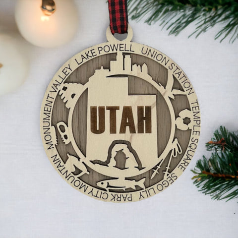 Elevate your holiday decor with the Utah State Highlights Ornament! A stunning tribute to the Beehive State's natural wonders and vibrant spirit. Bring home a piece of Utah's beauty this festive season.