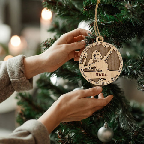 Serve up holiday cheer with our Personalized Volleyball Girl Sports Ornament! This unique and festive keepsake is perfect for celebrating the volleyball enthusiast in your life. Customize now for a special touch that captures the energy and passion of the game. 