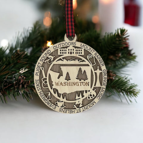 Unveil the beauty of the Evergreen State! Introducing the Washington Highlights Ornament—a miniature marvel capturing the essence of the Pacific Northwest. Elevate your holiday decor with a touch of Washington's wonders!