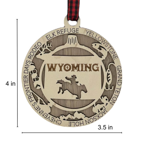 Unwrap the spirit of the Wild West!  Introducing the Wyoming State Highlights Ornament – a miniature masterpiece capturing the rugged beauty and untamed charm of the Cowboy State. Saddle up your holiday decor with a touch of Wyoming wanderlust!